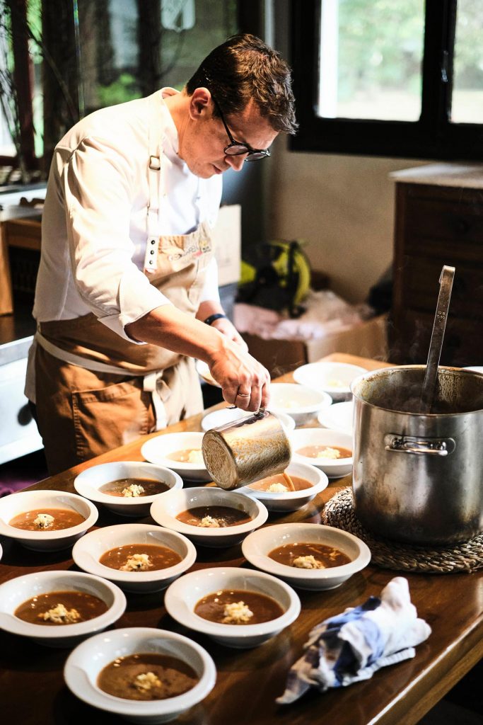 cvne chef preparing several dishes